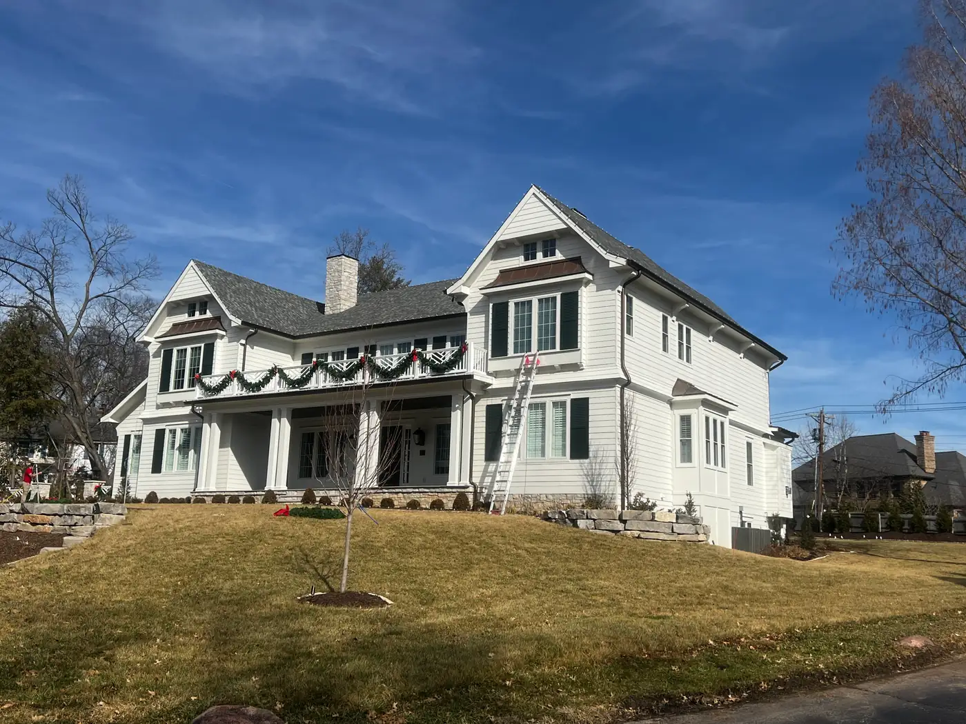 The same house in daylight without its Christmas lighting